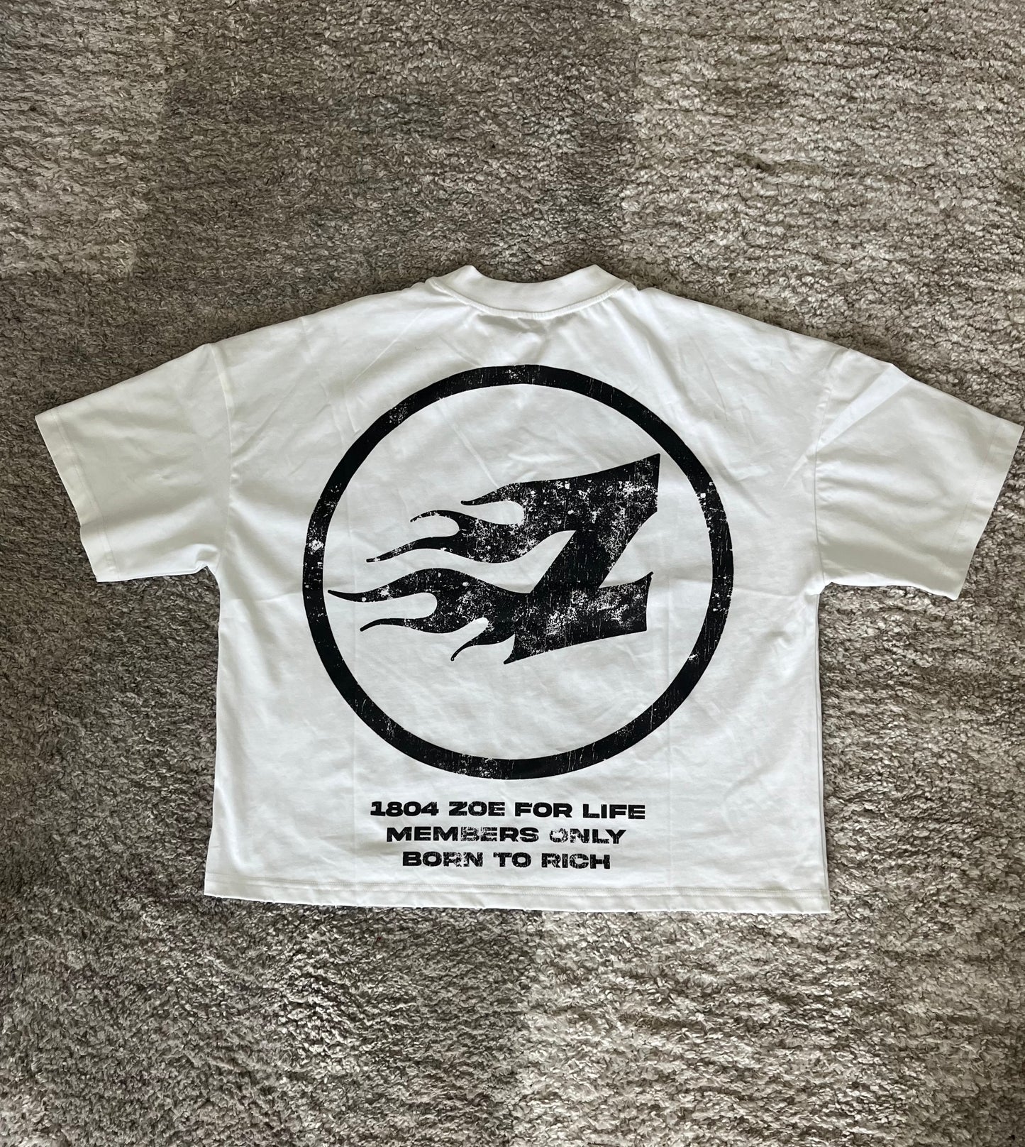 Zoe wears white skull t-shirt
